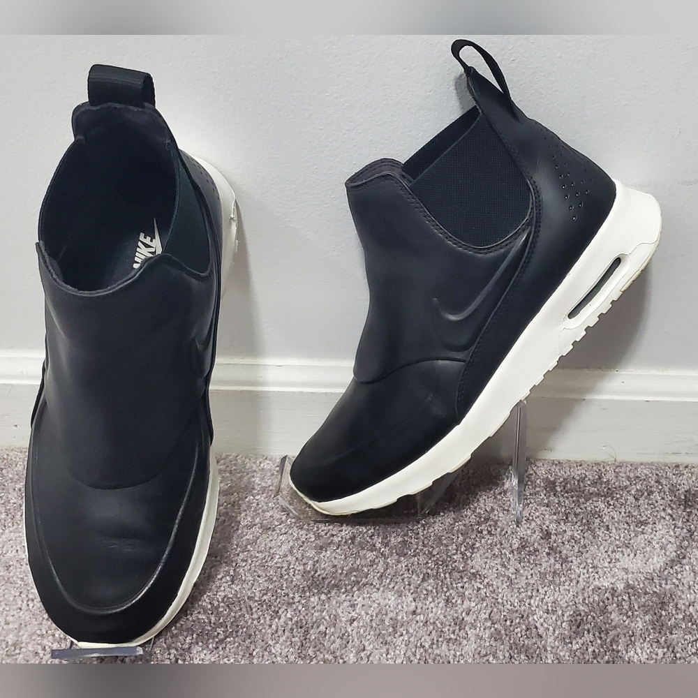 Nike Women's Black and White Slip-On Sneakers
